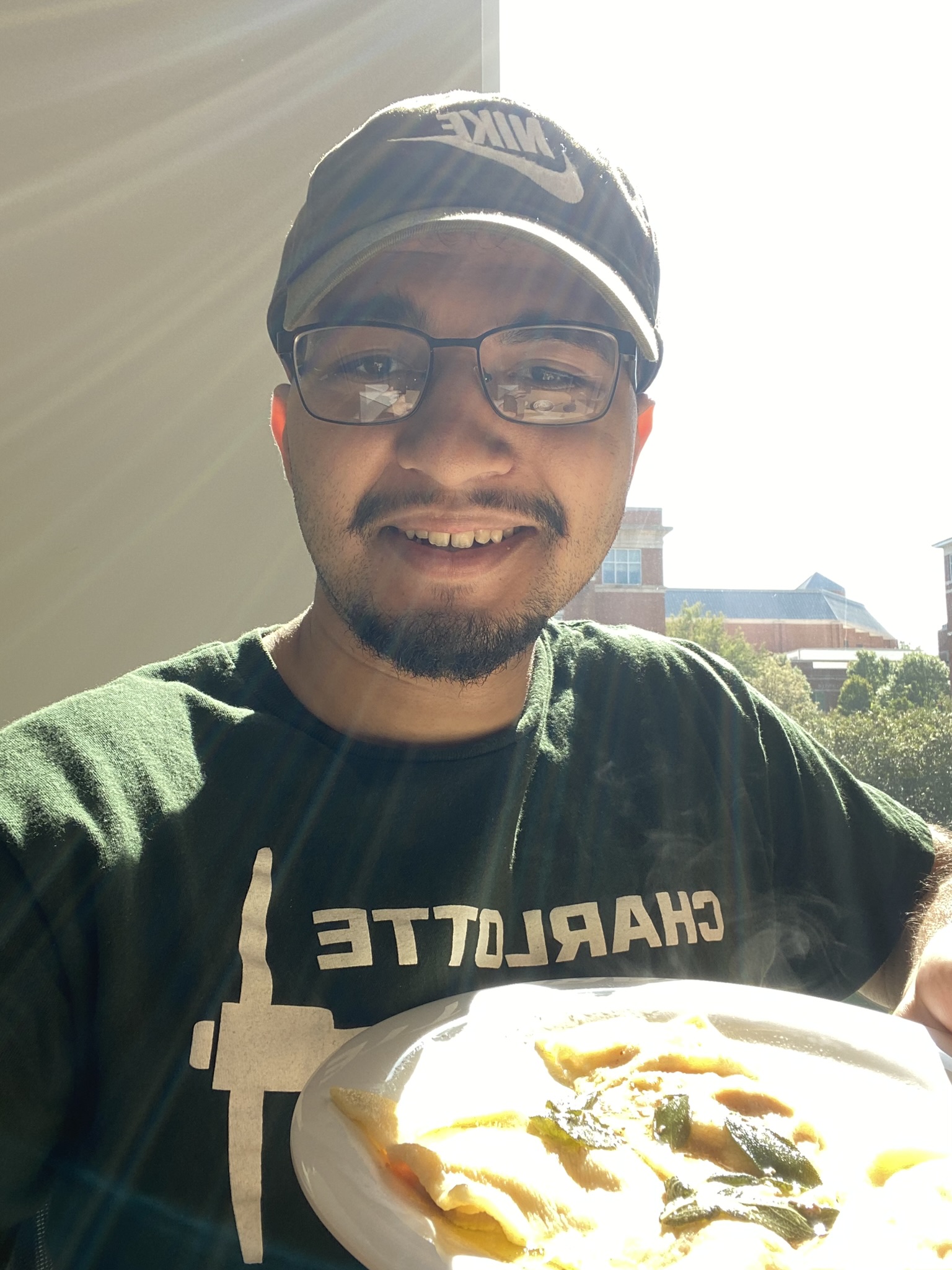 Image of Bilal Agrouane eating pumpkin ravioli he made